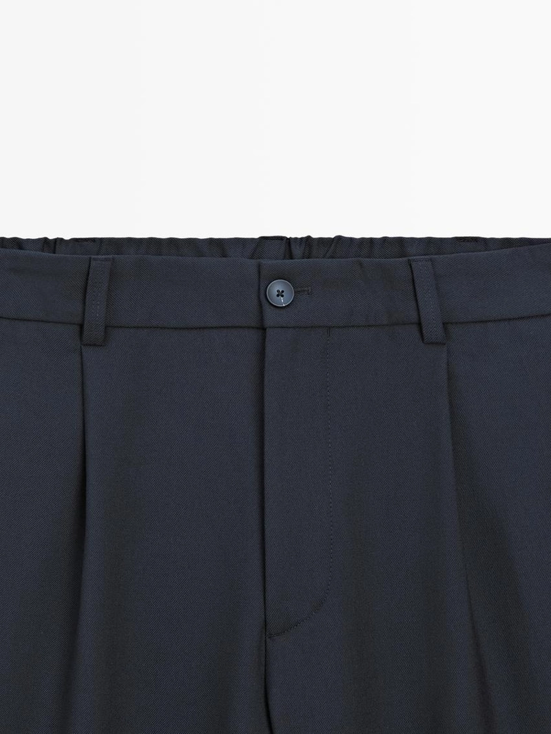 Брюки из шерстяной смеси свободного кроя с защипами