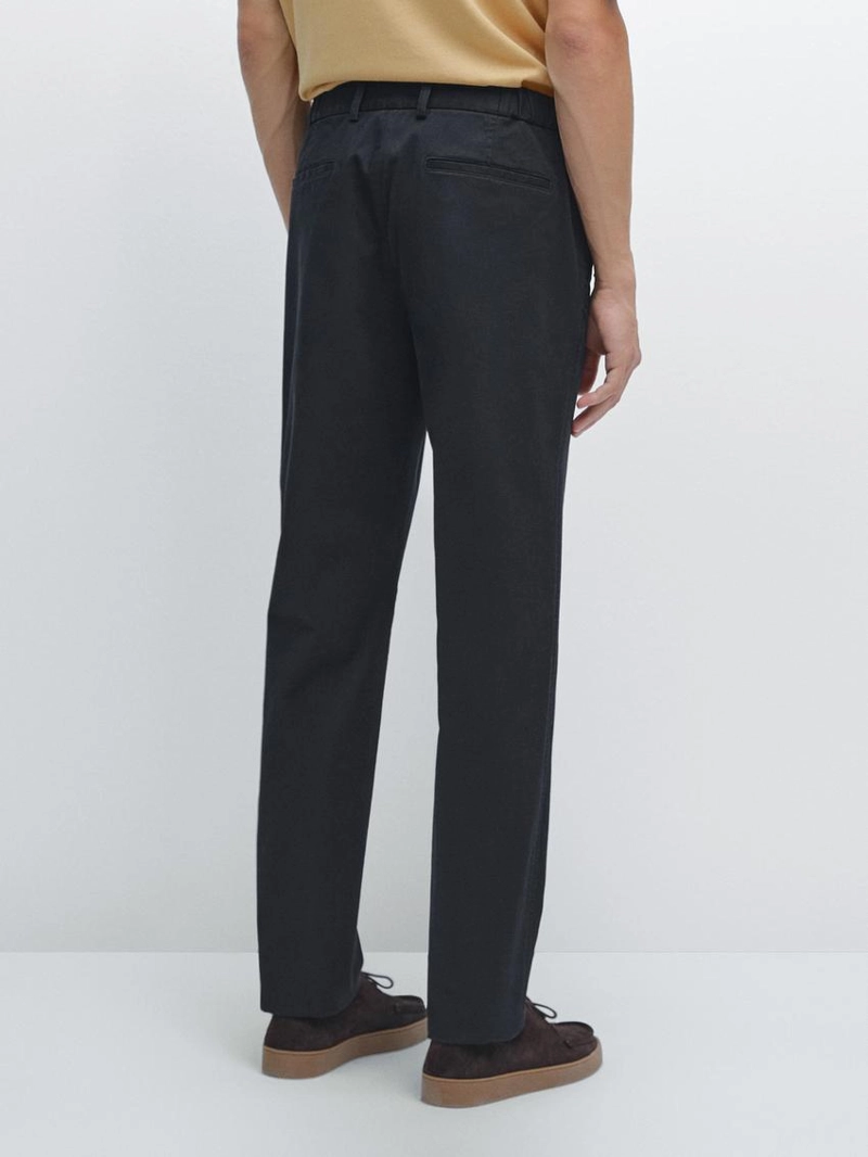 Брюки с узкой посадкой и эластичными вставками по бокам