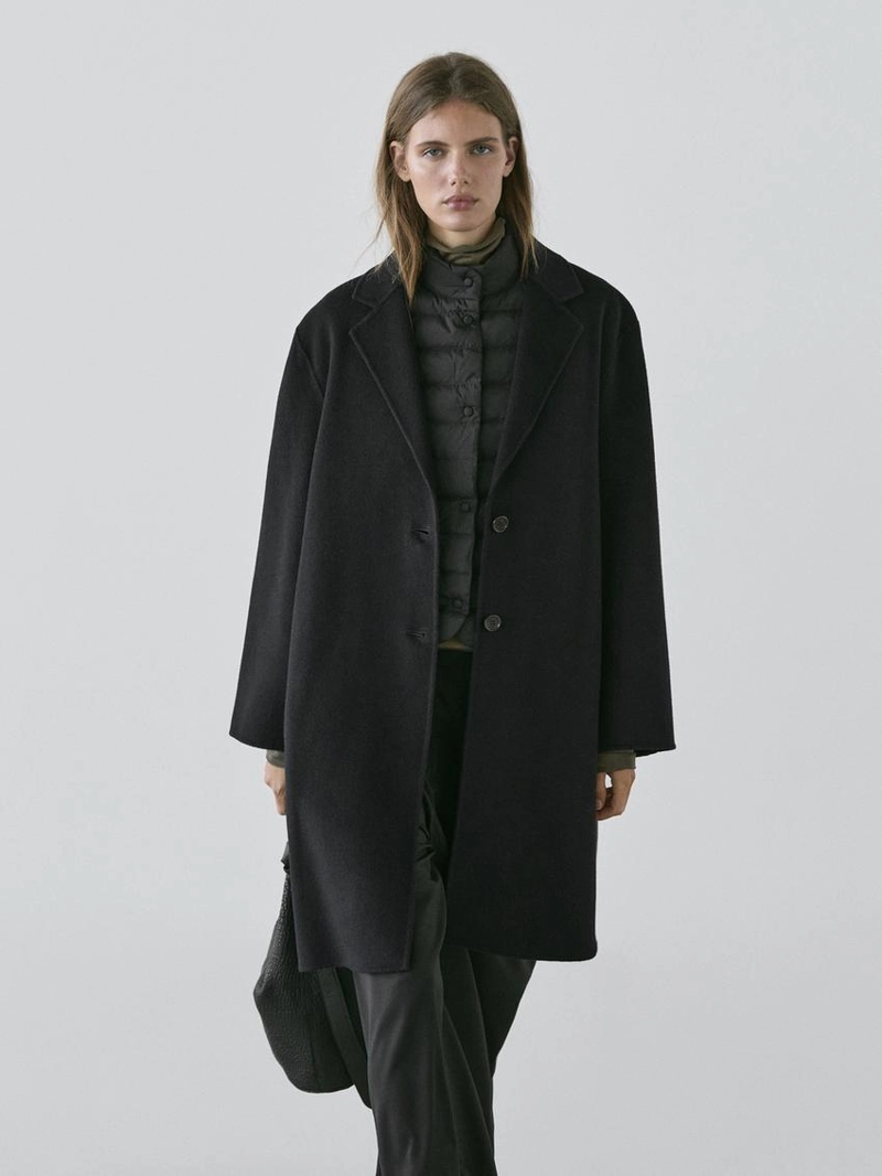 Стеганый пуховый жилет