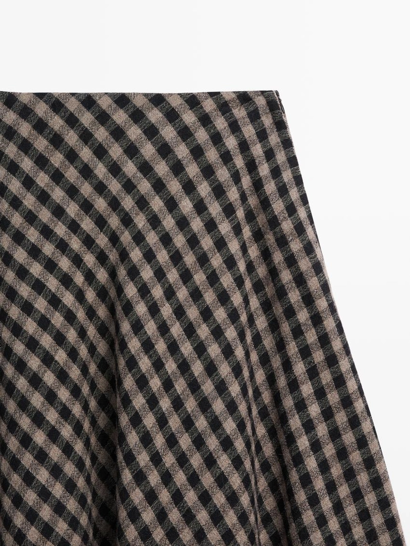 Расклешенная юбка с клетчатым узором