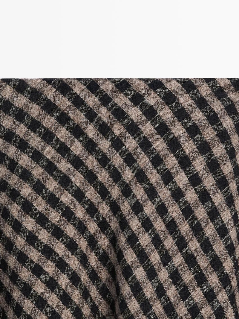 Расклешенная юбка с клетчатым узором