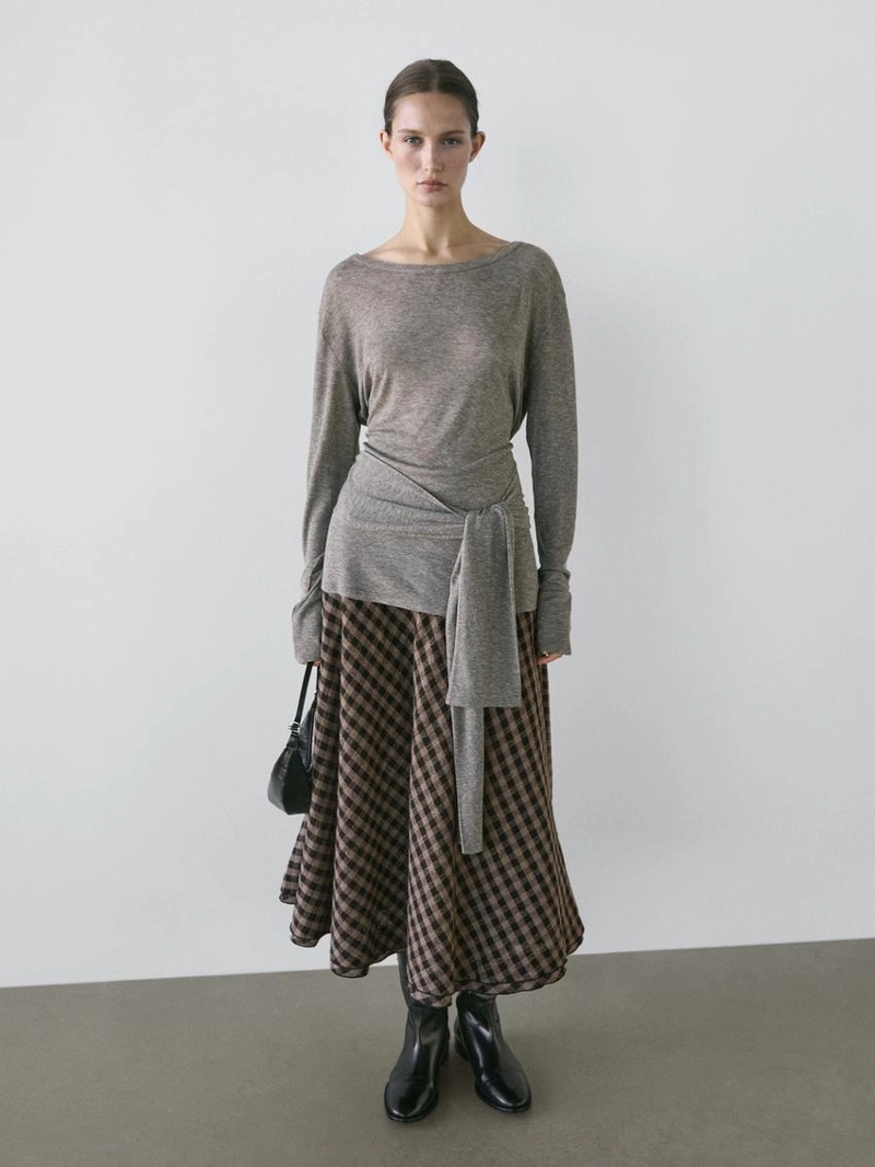 Расклешенная юбка с клетчатым узором