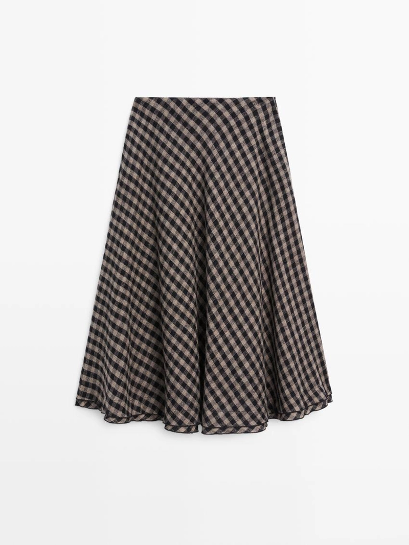 Расклешенная юбка с клетчатым узором