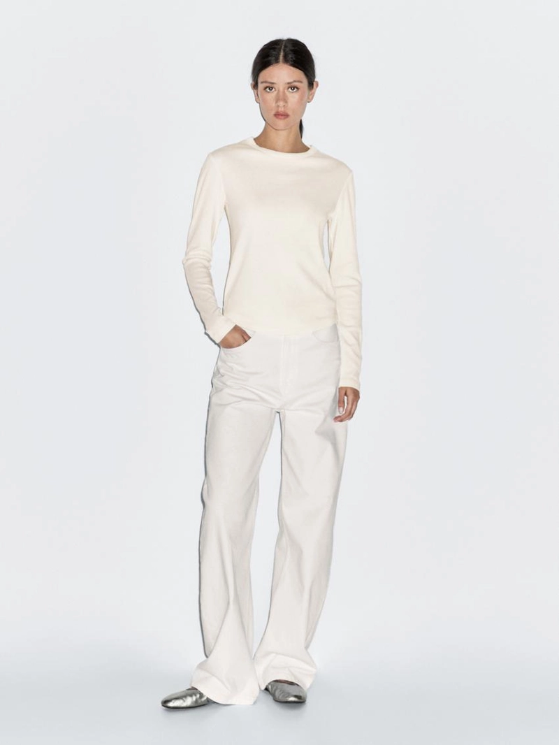 Футболка с длинным рукавом и закругленным подолом