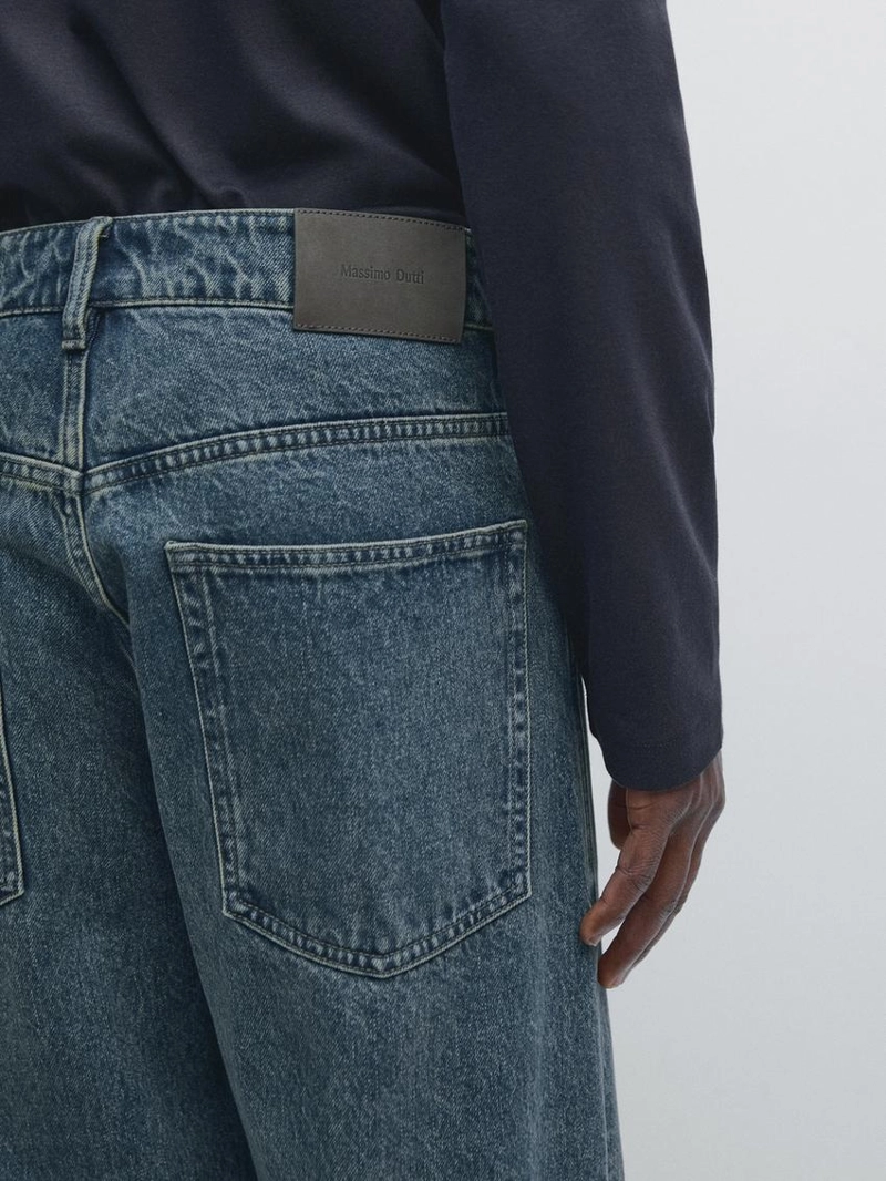 Джинсы с широкими штанинами