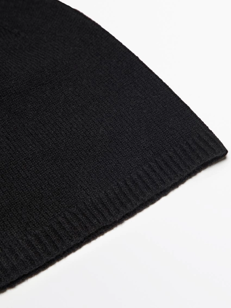 Тонкая вязаная шапка