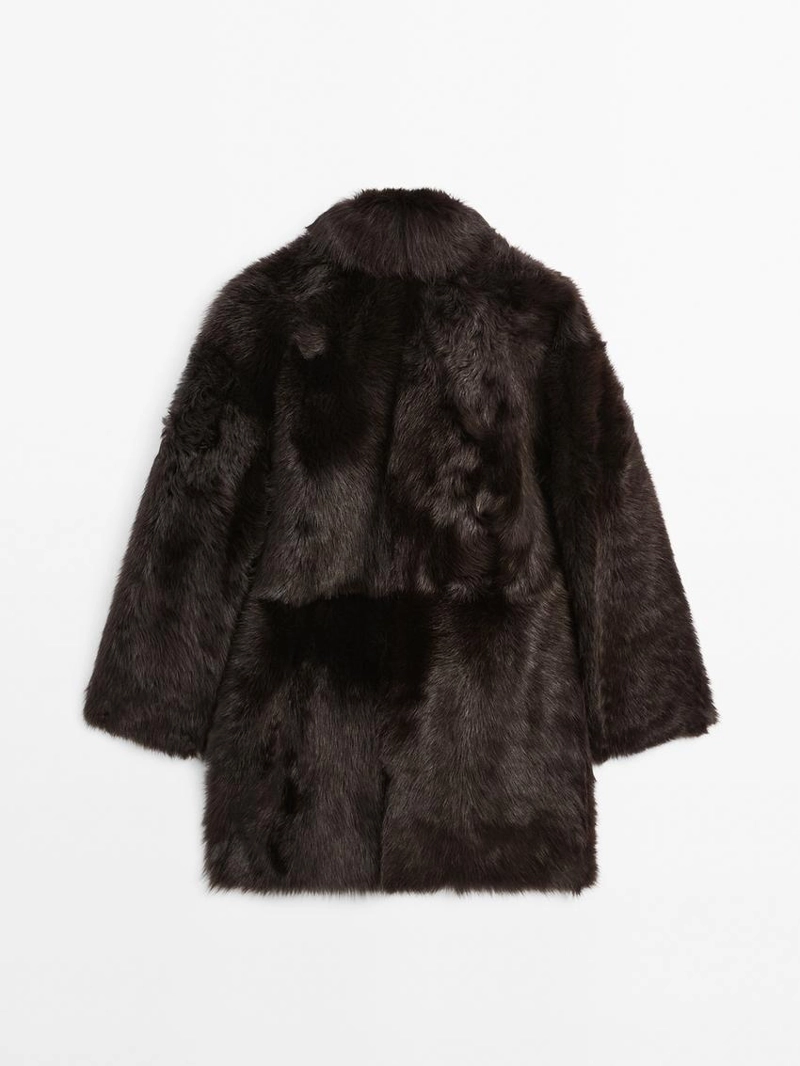 Длинное кожаное пальто с мехом