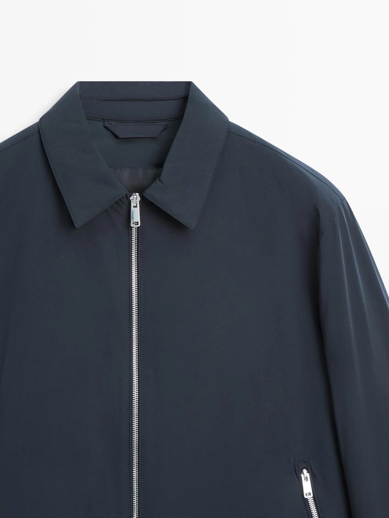 Короткий пиджак с деталями кармана