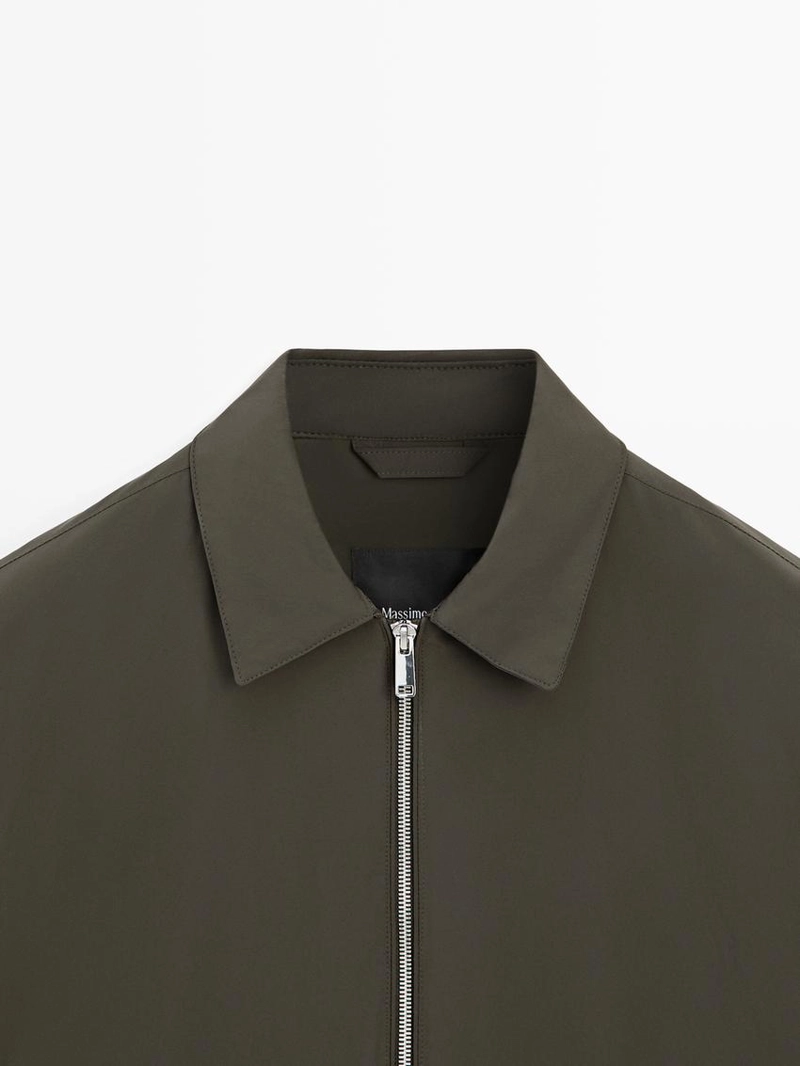 Короткий пиджак с деталями кармана