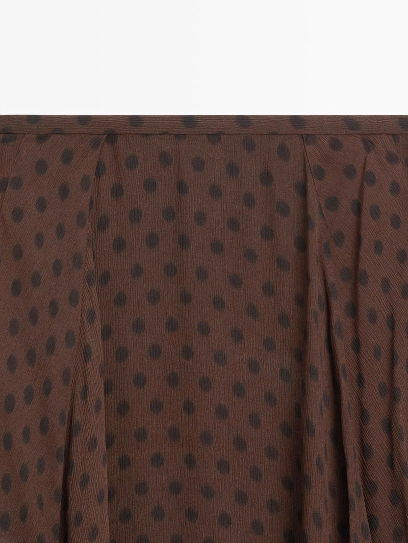 Юбка-миди в горох с расклешенным подолом