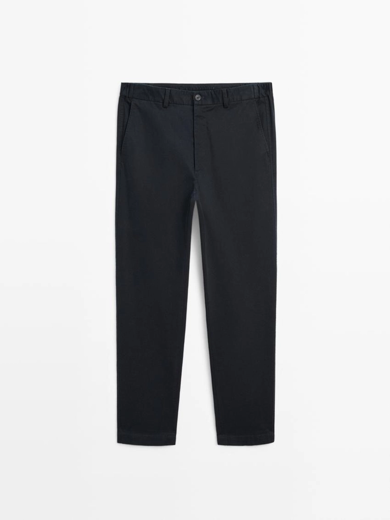 Брюки с зауженным кроем с эластичными вставками по бокам