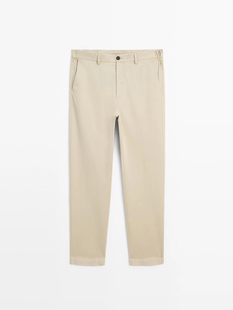 Брюки с зауженным кроем с эластичными вставками по бокам