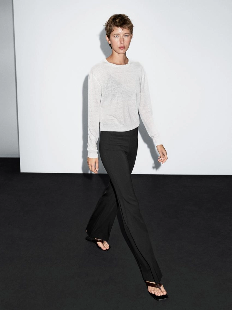 Брюки с расклешенными штанинами и карманом