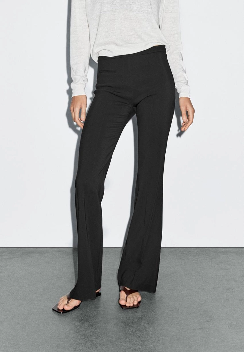 Брюки с расклешенными штанинами и карманом