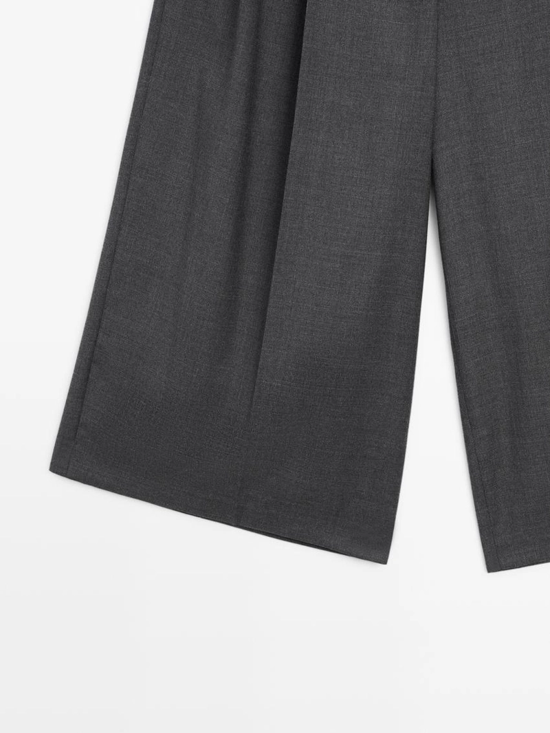 Бермуды из 100% шерсти с длинными дартсами