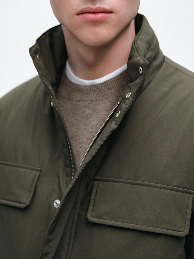 Пуховик с карманами и водоотталкивающей отделкой