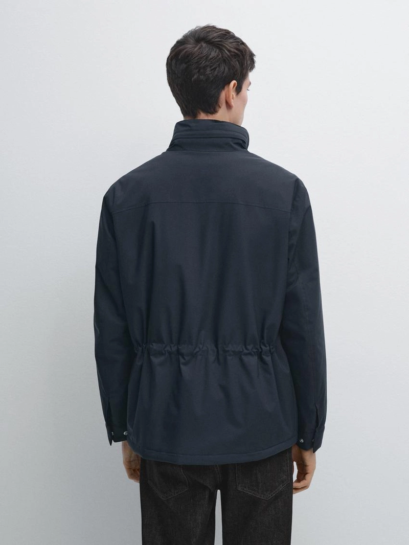 Пуховик с карманами и водоотталкивающей отделкой