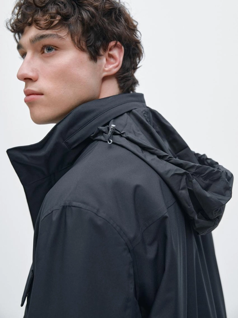 Пуховик с карманами и водоотталкивающей отделкой