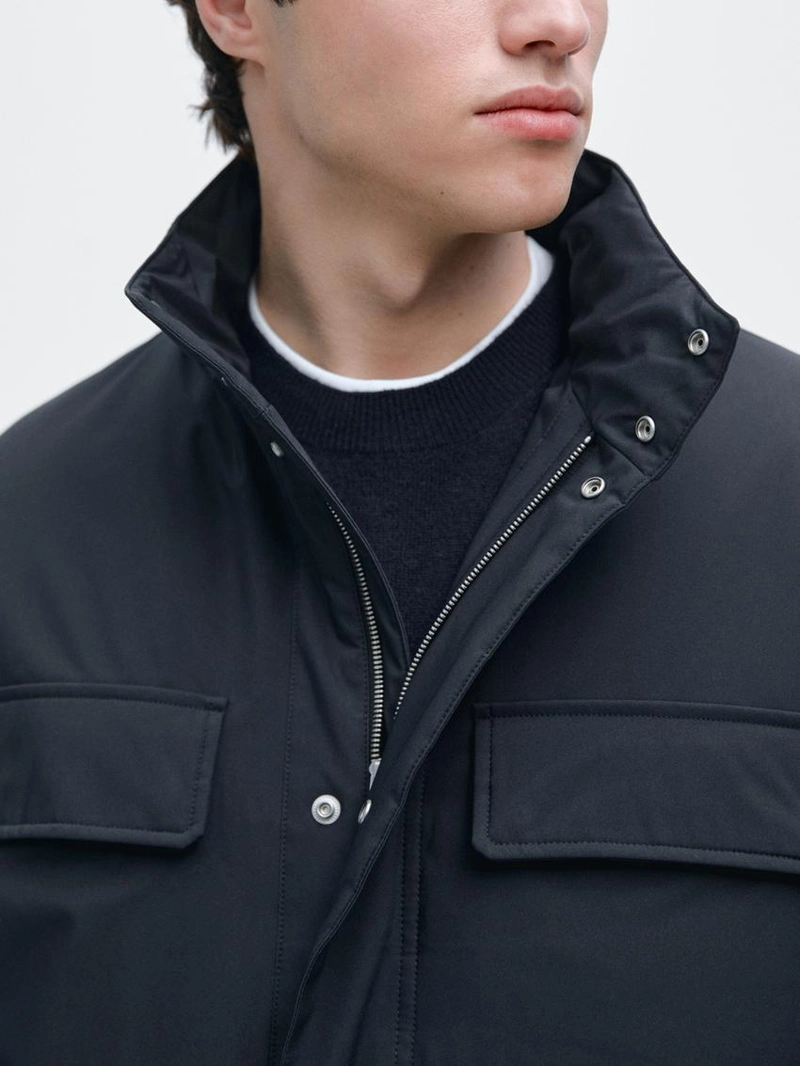 Пуховик с карманами и водоотталкивающей отделкой