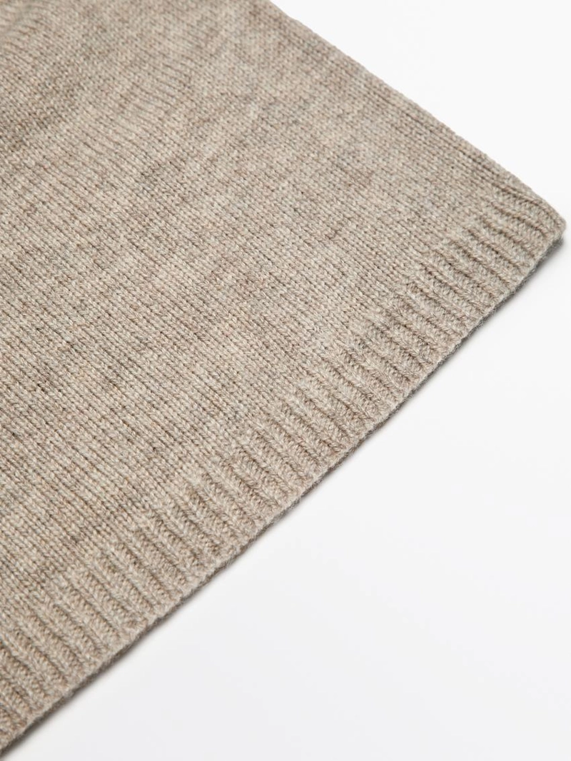 Тонкая вязаная шапка