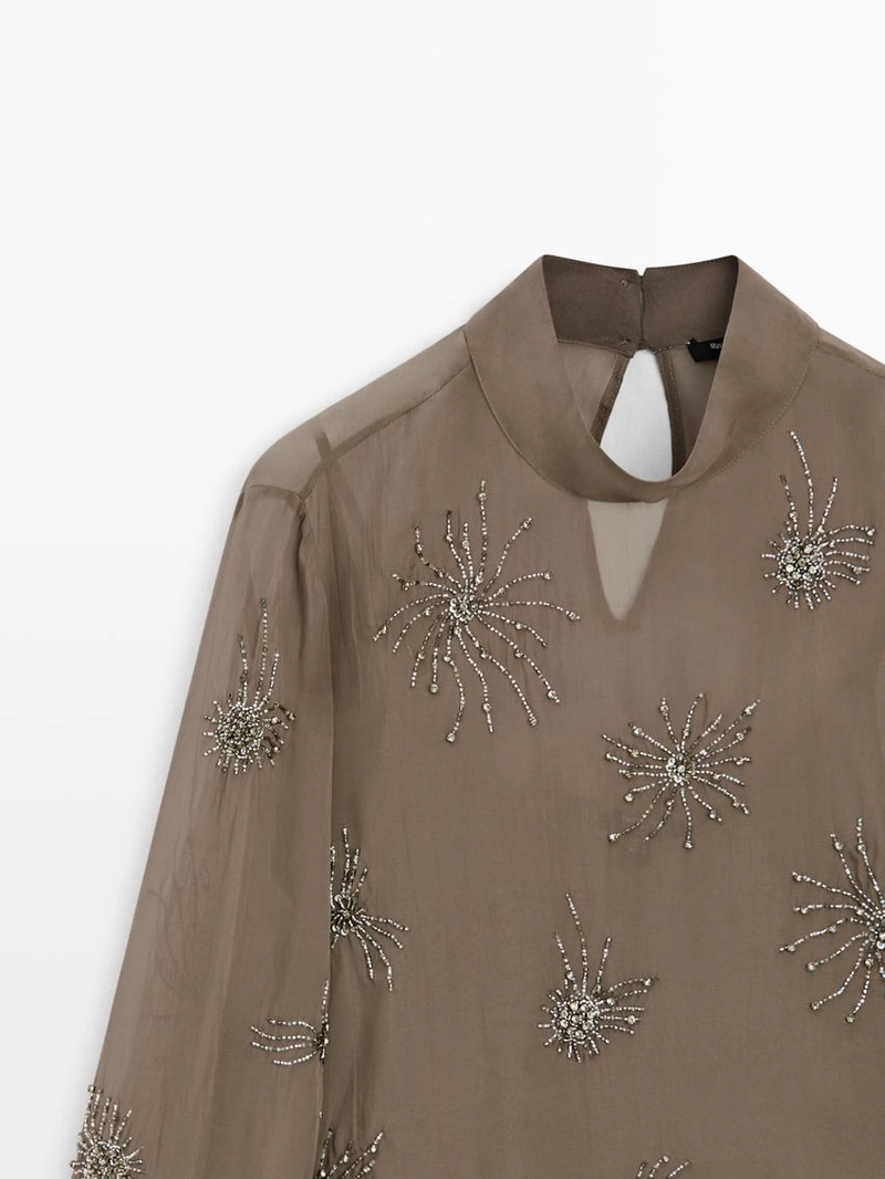 Блузка с вышивкой из полупрозрачной ткани