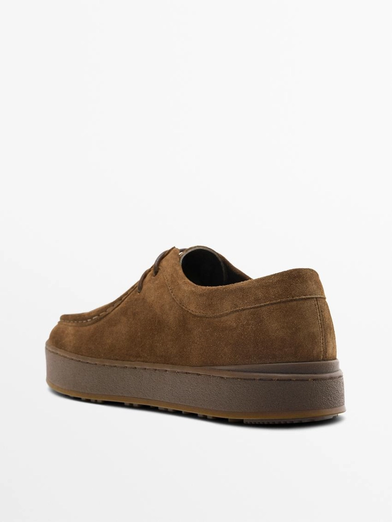 Кожаные туфли с мокасиновым мысом и массивной подошвой