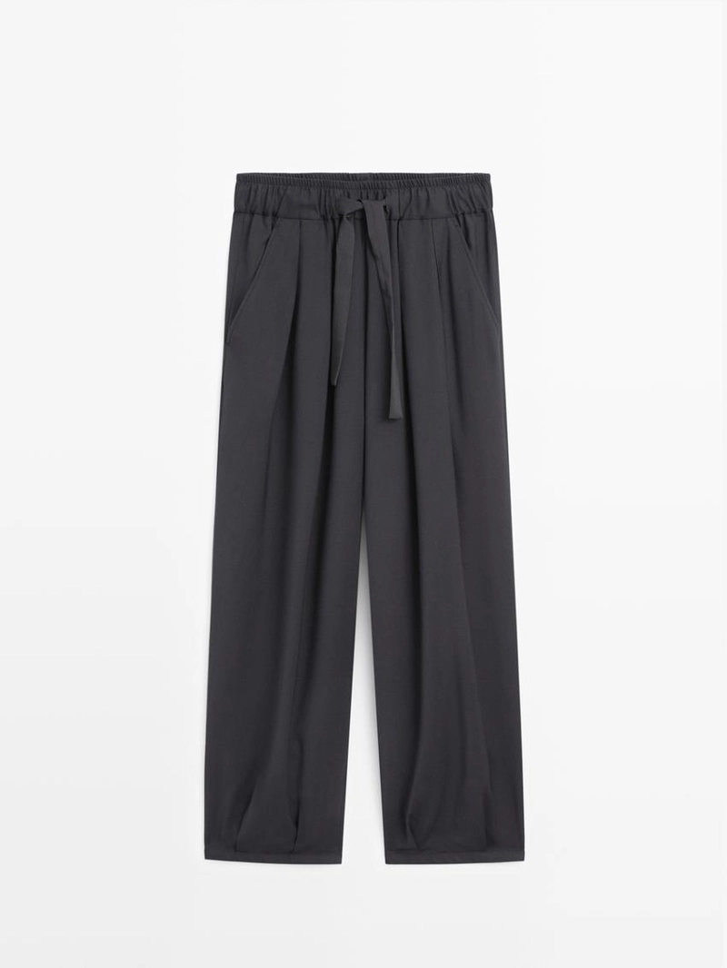 Широкие брюки с объемными складками