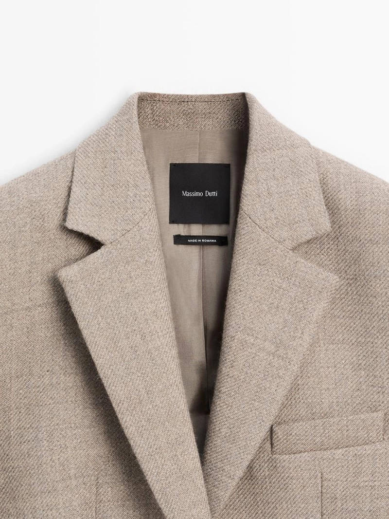 Шерстяной пиджак в мелкую клетку