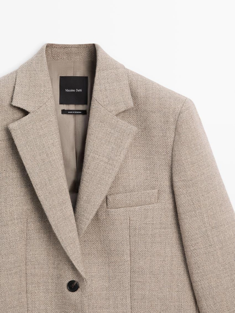 Шерстяной пиджак в мелкую клетку