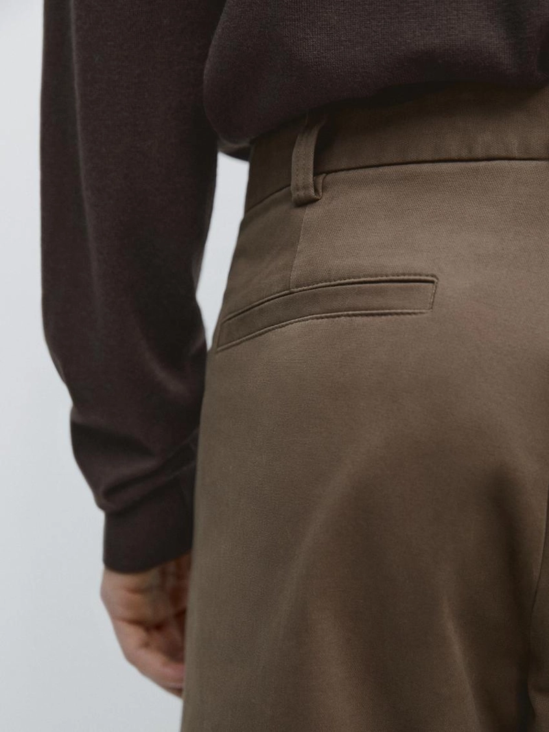 Брюки с зауженным кроем из микротекстурированного материала