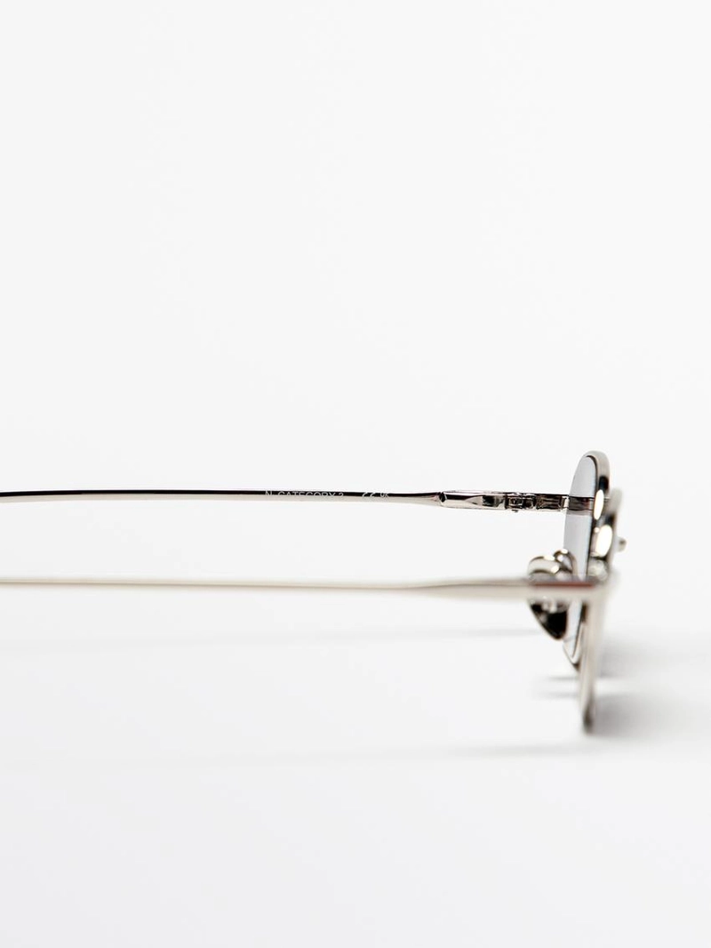 Солнцезащитные очки с металлической оправой в форме гексагона