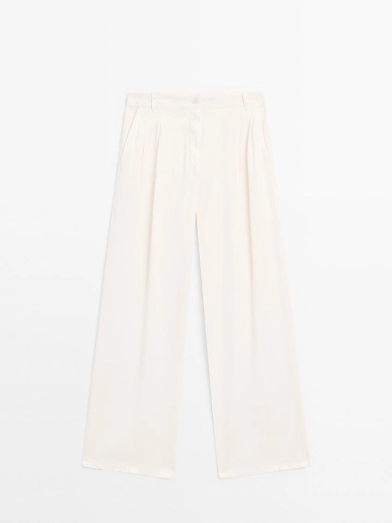 Брюки с широкими брючинами и двойными стрелками