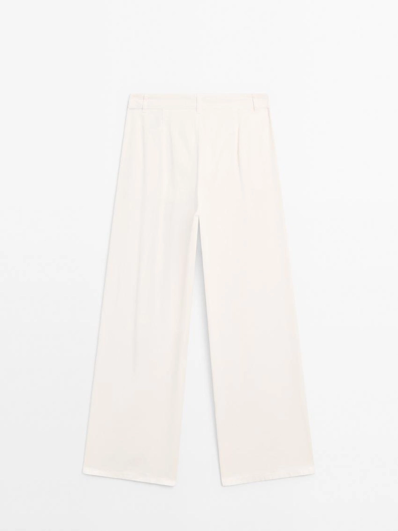 Брюки с широкими брючинами и двойными стрелками