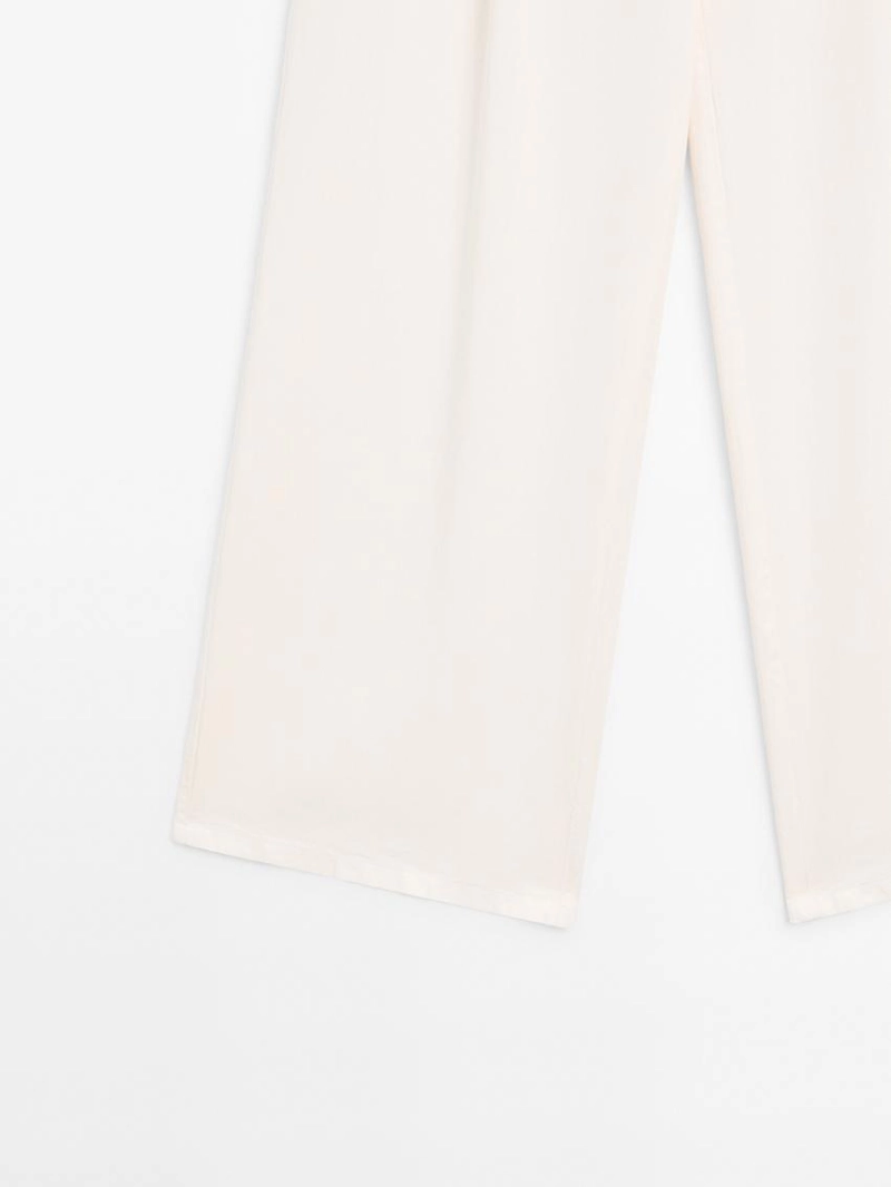 Брюки с широкими брючинами и двойными стрелками