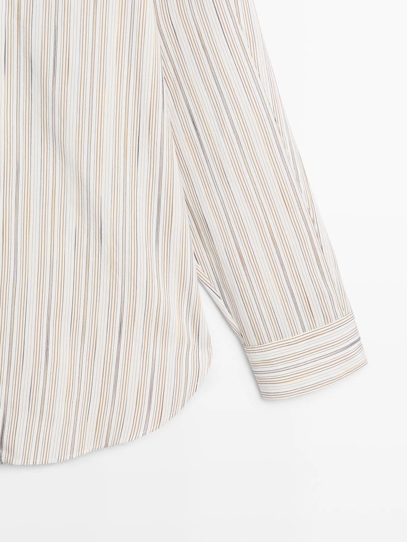 Рубашка в полоску с плавным фасоном