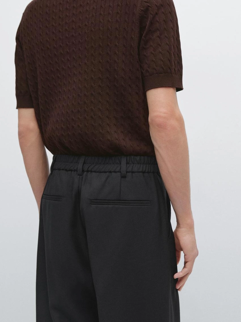 Брюки из шерсти свободного кроя с защипами