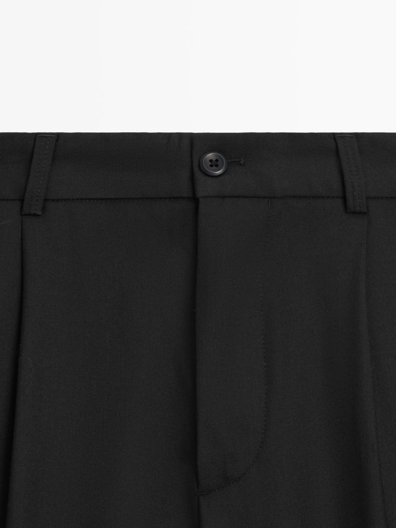 Брюки из шерсти свободного кроя с защипами