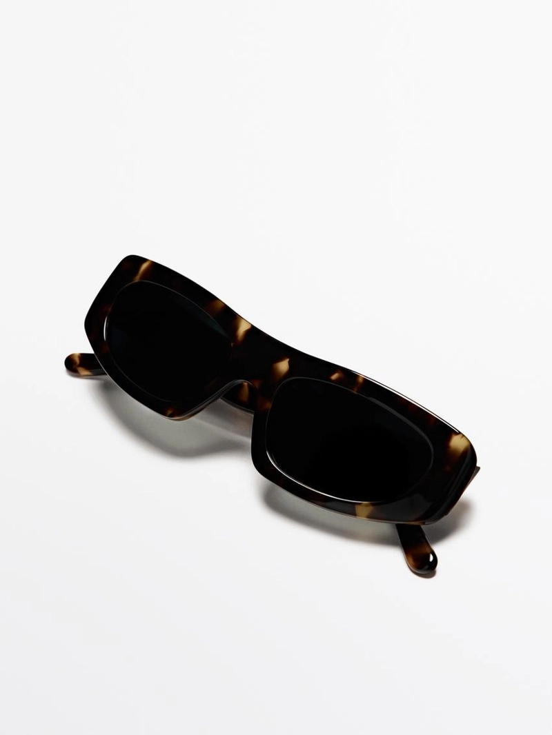 Солнечные очки овальные