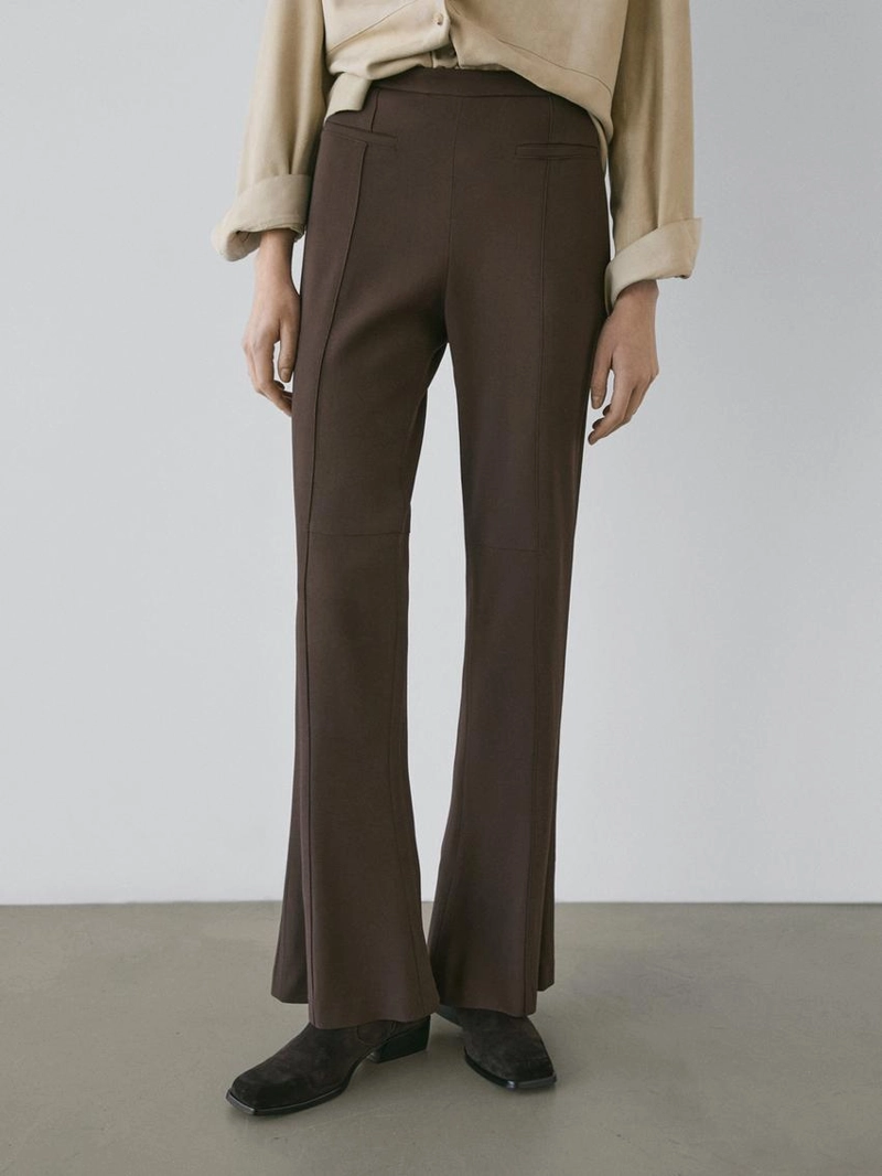 Брюки-клеш с карманом