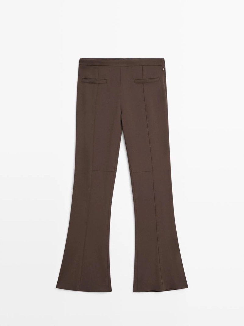 Брюки-клеш с карманом