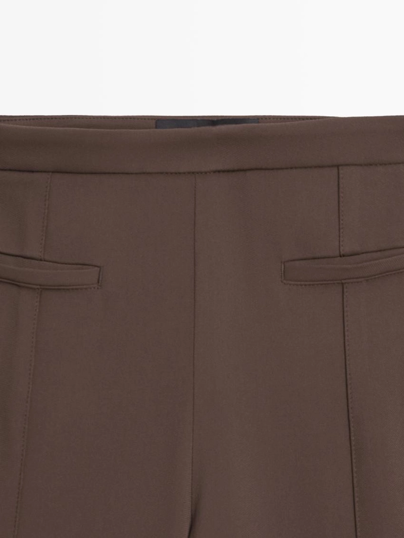 Брюки-клеш с карманом