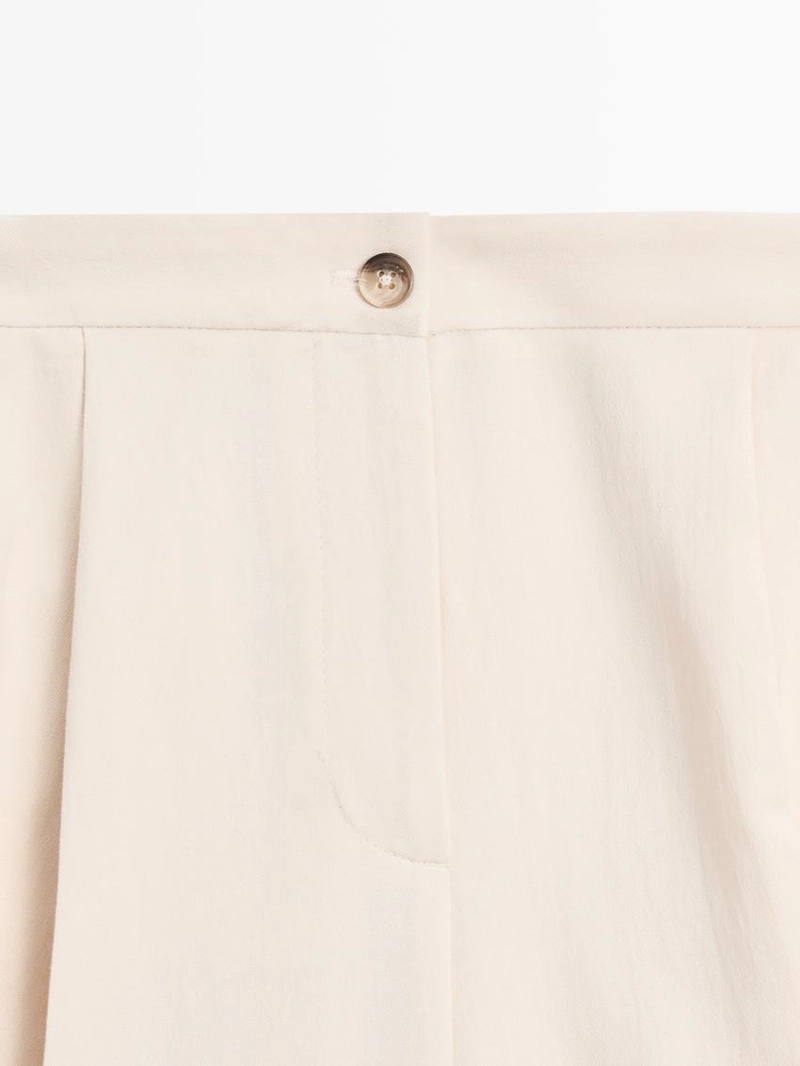 Брюки с манжетами на завышенной талии