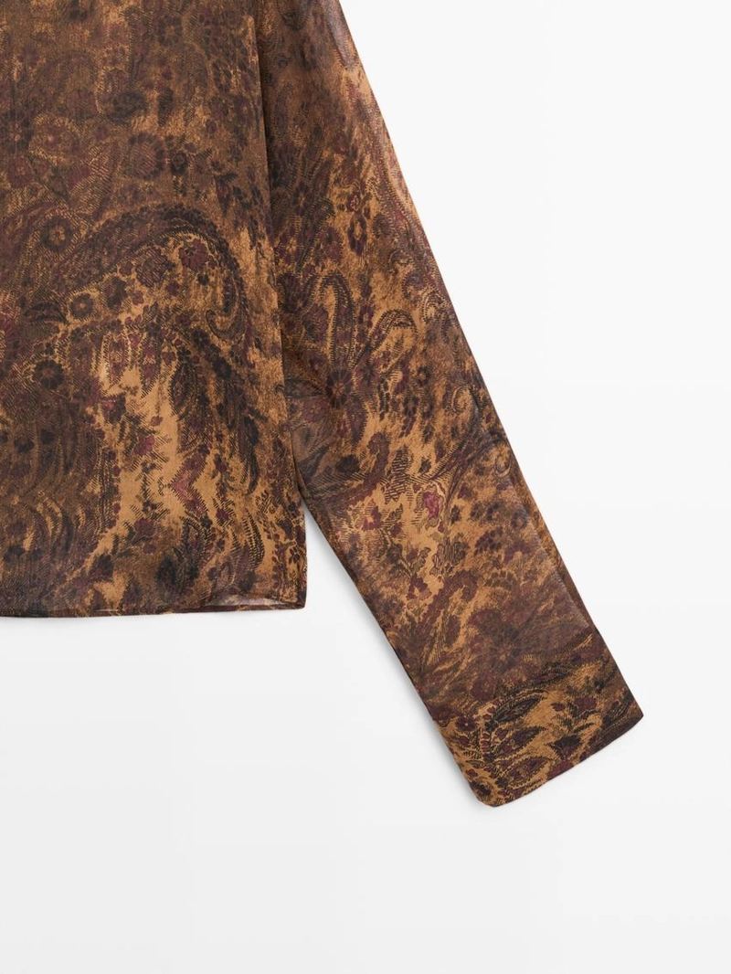 Блузка с принтом в полоску