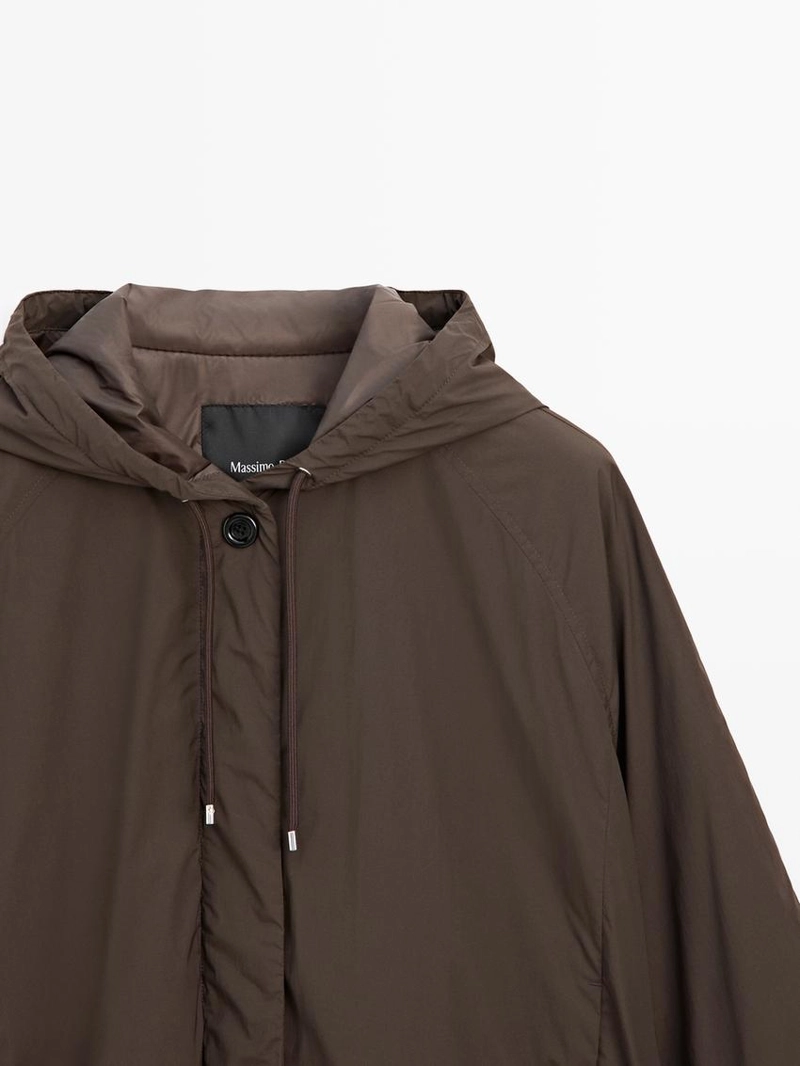 Пуховик с высоким воротником