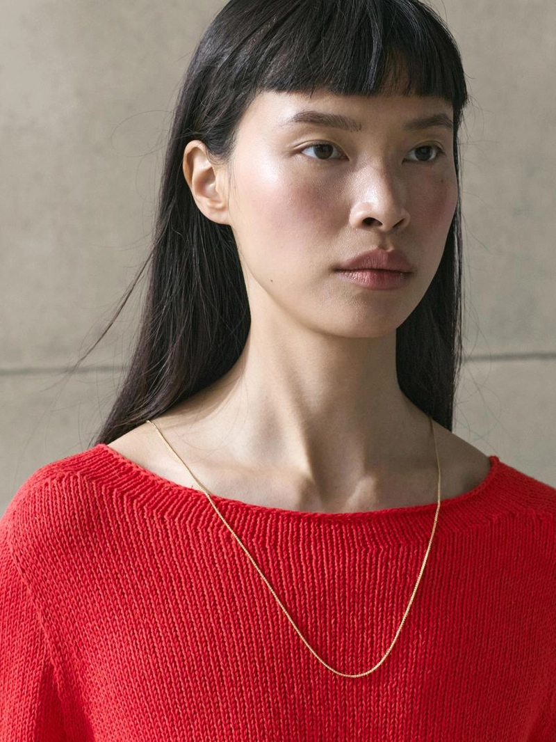 Асимметричный вязаный свитер