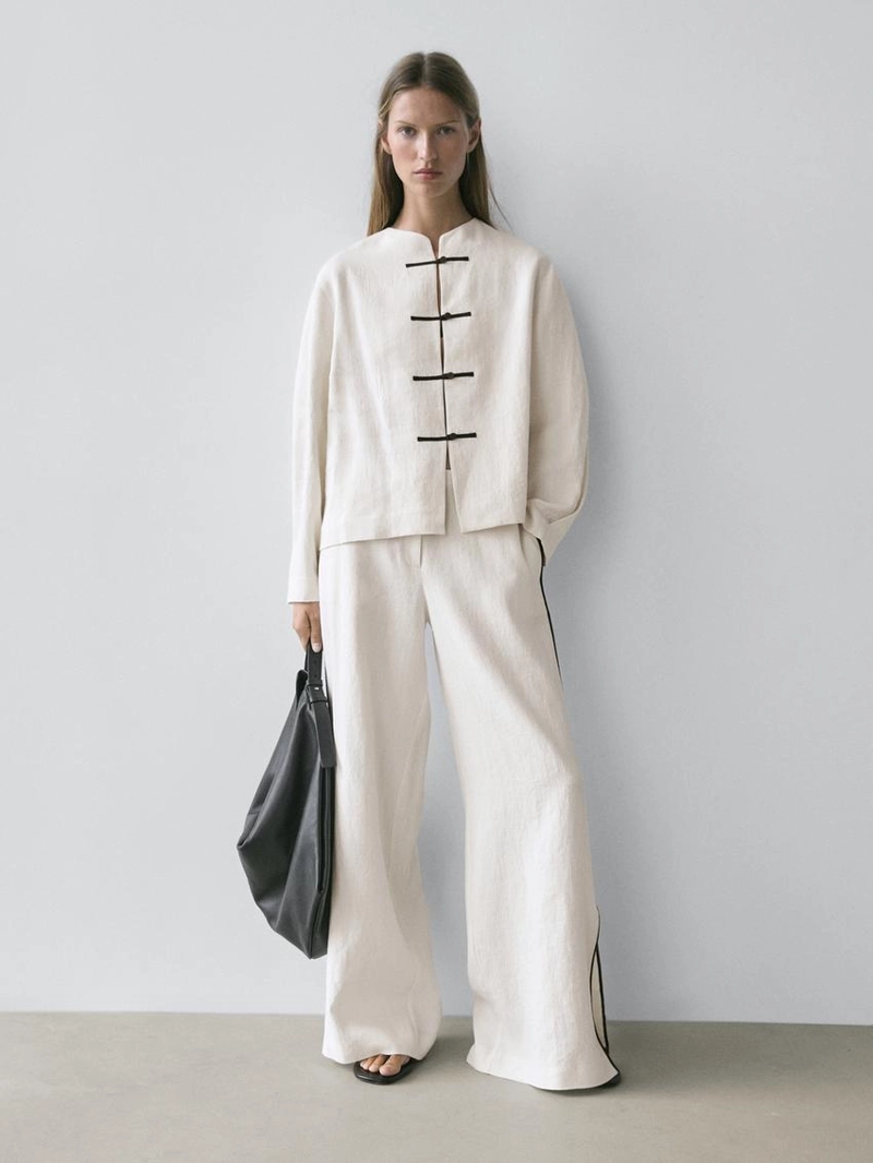 Брюки из льна с контрастной отделкой