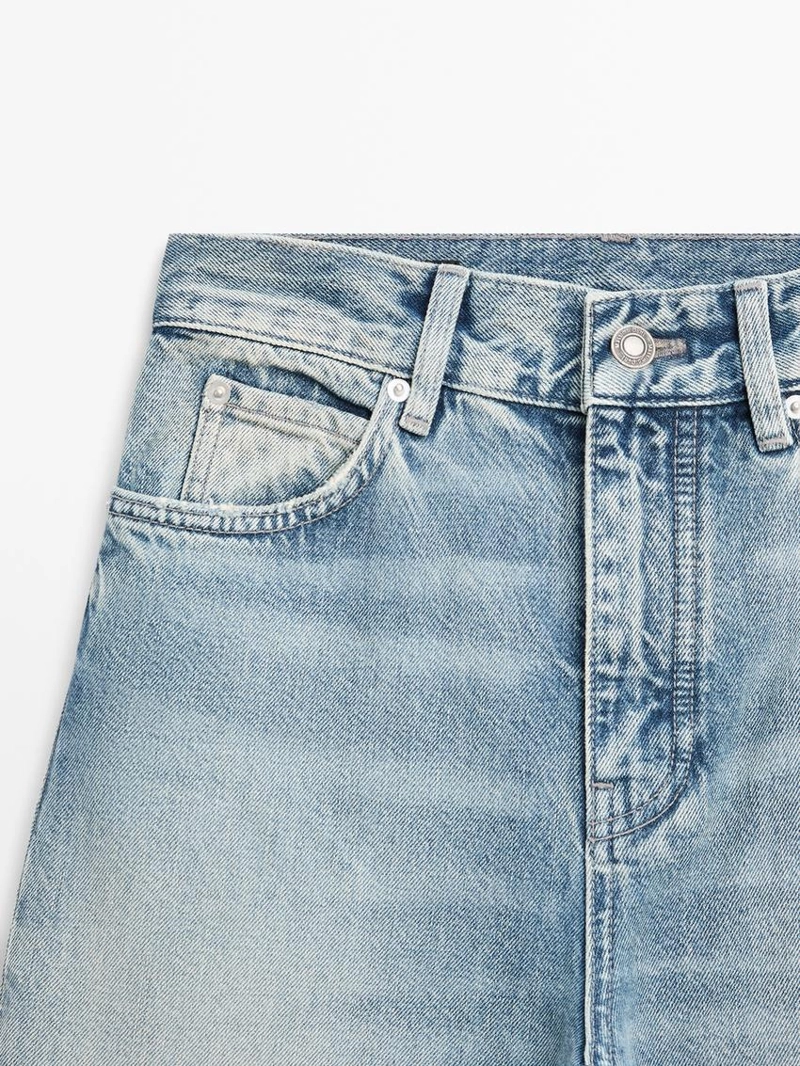 Джинсы с высокой посадкой и широкими брючинами