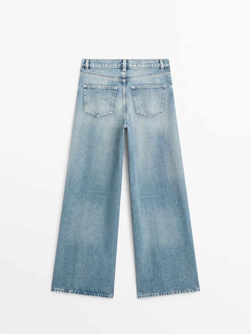 Джинсы с высокой посадкой и широкими брючинами