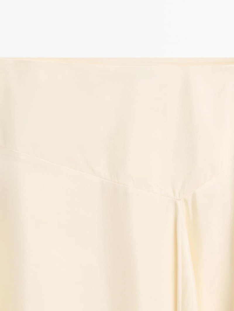 Асимметричная юбка с деталями из кружева