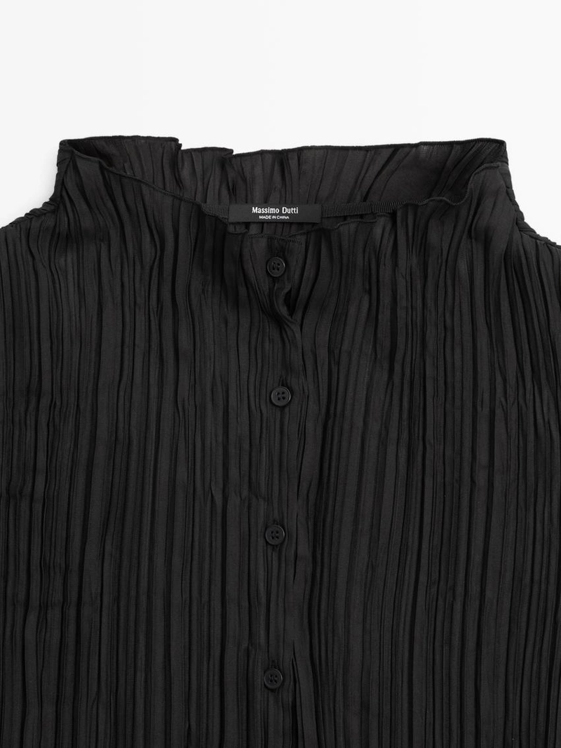 Рубашка с драпировкой и складками